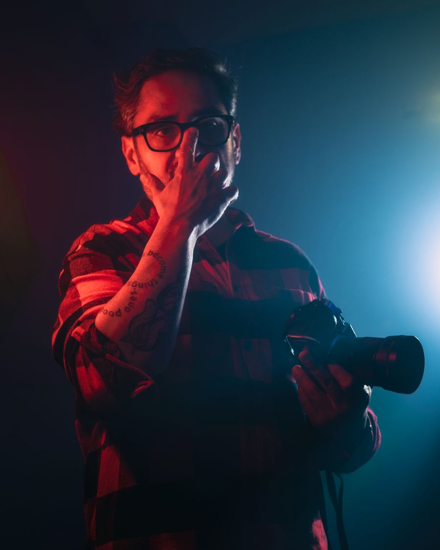 A creator working behind a camera